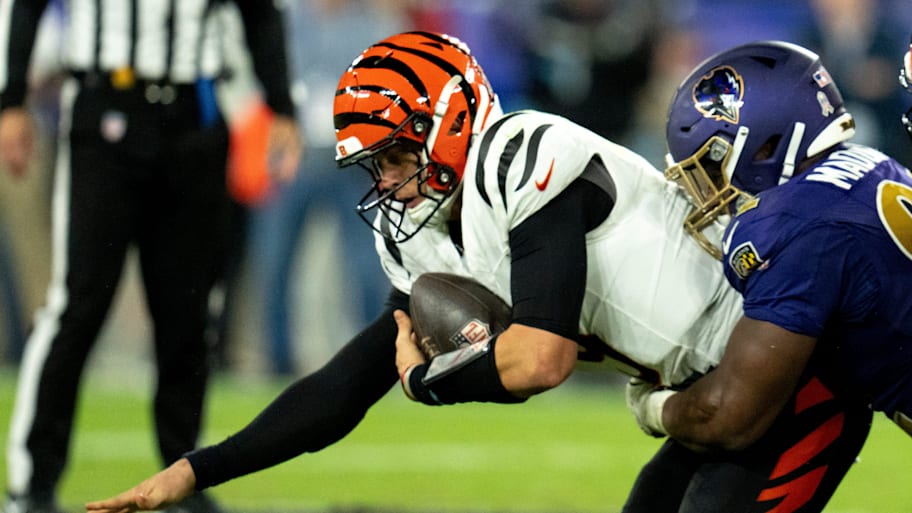Baltimore Ravens defensive tackle Nnamdi Madubuike (92) tackles Cincinnati Bengals quarterback Joe Burrow (9) in the third quarter of the NFL game at M&T Banks Stadium in Baltimore on Thursday, Nov. 7, 2024. | Albert Cesare/The Enquirer / USA TODAY NETWORK via Imagn Images