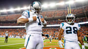Cam Newton strikes his Superman pose, and now comments on Bears QB Caleb Williams, whose nickname is "Superman." 
