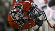 Nov 13, 2021; Winston-Salem, North Carolina, USA; A North Carolina State Wolfpack helmet seen on the sideline during the second half against the Wake Forest Demon Deacons at Truist Field. Mandatory Credit: William Howard-Imagn Images