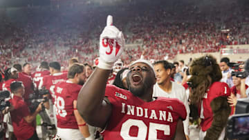 Sep 20, 2025; Bloomington, Indiana, USA; Indiana Hoosiers defensive lineman Tyrique Tucker (95) celebrates after defeating the Illinois Fighting Illini at Memorial Stadium. 