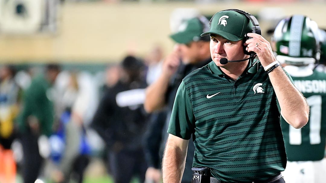 Sep 28, 2024; East Lansing, Michigan, USA; Michigan State Spartans head coach Jonathan Smith watches from the sidelines during the fourth quarter as the Ohio State Buckeyes defeat his team at Spartan Stadium. Mandatory Credit: Dale Young-Imagn Images
