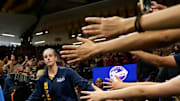 Indiana Fever guard Caitlin Clark (22) takes the court before an Indiana Fever game against the Brazil National Team May 4, 2025 at Carver-Hawkeye Arena in Iowa City, Iowa.