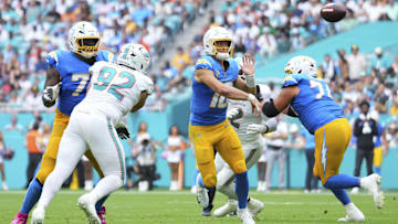 Oct 12, 2025; Miami Gardens, Florida, USA; Los Angeles Chargers quarterback Justin Herbert (10) throws a pass against the Miami Dolphins during the second quarter at Hard Rock Stadium. Mandatory Credit: Rich Storry-Imagn Images