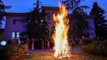 A bonfire is a common way to celebrate the season.
