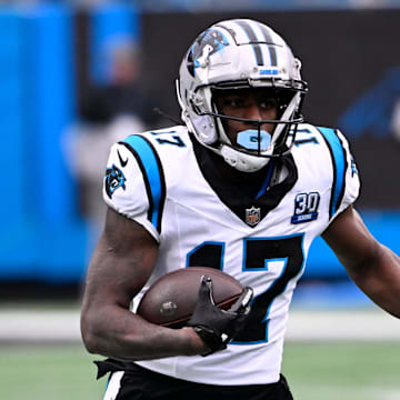 Dec 15, 2024; Charlotte, North Carolina, USA; Carolina Panthers wide receiver Xavier Legette (17) with the ball in the first quarter at Bank of America Stadium. Mandatory Credit: Bob Donnan-Imagn Images