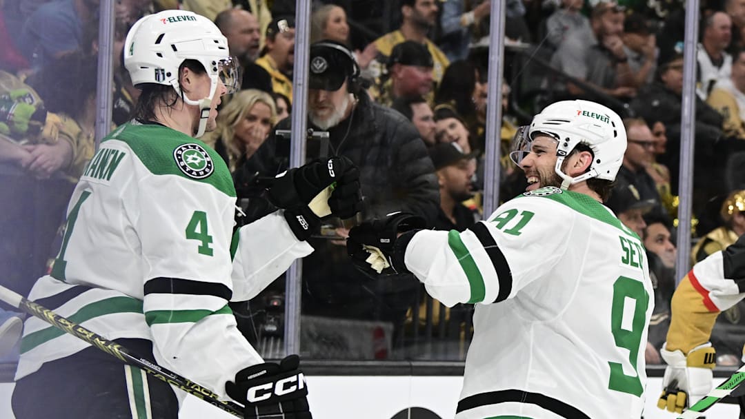 Apr 27, 2024; Las Vegas, Nevada, USA; Dallas Stars defenseman Miro Heiskanen (4) celebrates his second-period goal with center Tyler Seguin (91) against the Vegas Golden Knights in game three of the first round of the 2024 Stanley Cup Playoffs at T-Mobile Arena. Mandatory Credit: Candice Ward-Imagn Images