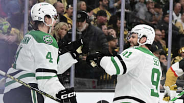 Apr 27, 2024; Las Vegas, Nevada, USA; Dallas Stars defenseman Miro Heiskanen (4) celebrates his second-period goal with center Tyler Seguin (91) against the Vegas Golden Knights in game three of the first round of the 2024 Stanley Cup Playoffs at T-Mobile Arena. Mandatory Credit: Candice Ward-Imagn Images