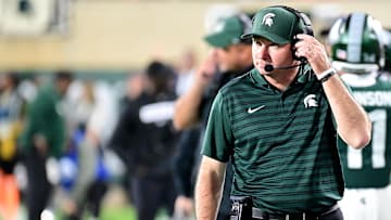Sep 28, 2024; East Lansing, Michigan, USA; Michigan State Spartans head coach Jonathan Smith watches from the sidelines during the fourth quarter as the Ohio State Buckeyes defeat his team at Spartan Stadium. Mandatory Credit: Dale Young-Imagn Images