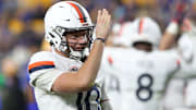 Virginia Cavaliers quarterback Anthony Colandrea (10) gestures to the Pittsburgh student section after a Cavaliers touchdown against the Pittsburgh Panthers during the third quarter at Acrisure Stadium. Mandatory Credit: Charles LeClaire-Imagn Images