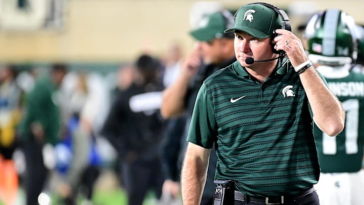 Sep 28, 2024; East Lansing, Michigan, USA; Michigan State Spartans head coach Jonathan Smith watches from the sidelines during the fourth quarter as the Ohio State Buckeyes defeat his team at Spartan Stadium. Mandatory Credit: Dale Young-Imagn Images