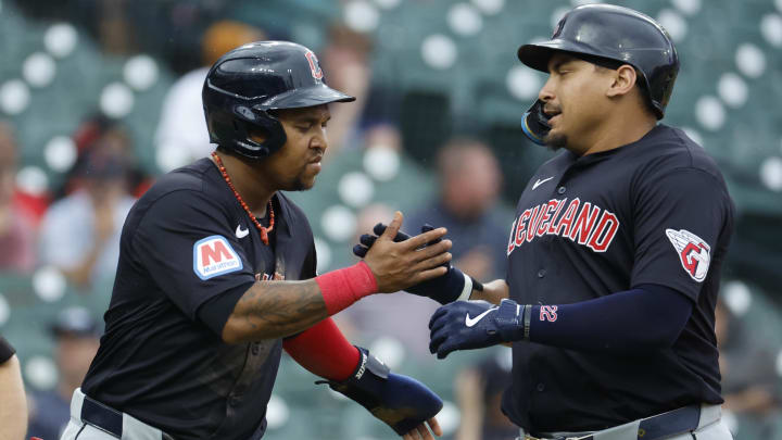 Jul 9, 2024; Detroit, Michigan, USA;  Cleveland Guardians first base Josh Naylor (22) receives congratulations from third base Jose Ramírez (11) after he hits a two run home run in the first inning against the Detroit Tigers at Comerica Park. Mandatory Credit: Rick Osentoski-USA TODAY Sports