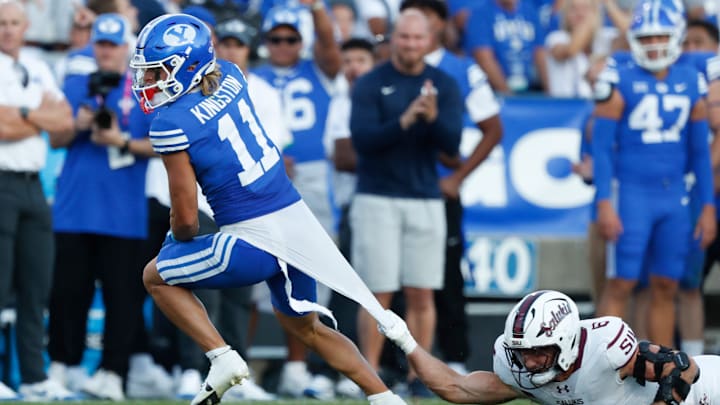 BYU's Parker Kingston sheds a tackle against the Southern Illinois Salukis.