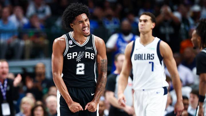 Oct 22, 2025; Dallas, Texas, USA;   San Antonio Spurs guard Dylan Harper (2) reacts during the first half against the Dallas Mavericks at American Airlines Center. Mandatory Credit: Kevin Jairaj-Imagn Images