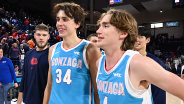 Gonzaga Bulldogs forward Braden Huff (34) and Gonzaga Bulldogs guard Dusty Stromer (4) celebrate after a victory over the Yale Bulldogs at McCarthey Athletic Center in Nov. 2023.