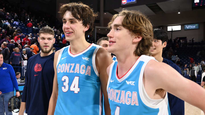 Gonzaga Bulldogs forward Braden Huff (34) and Gonzaga Bulldogs guard Dusty Stromer (4) celebrate after a victory over the Yale Bulldogs at McCarthey Athletic Center in Nov. 2023.