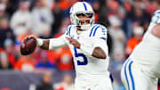 Dec 15, 2024; Denver, Colorado, USA; Indianapolis Colts quarterback Anthony Richardson (5) prepares to pass the ball in the second half against the Denver Broncos at Empower Field at Mile High. Mandatory Credit: Ron Chenoy-Imagn Images