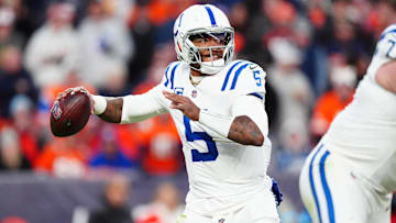 Dec 15, 2024; Denver, Colorado, USA; Indianapolis Colts quarterback Anthony Richardson (5) prepares to pass the ball in the second half against the Denver Broncos at Empower Field at Mile High. Mandatory Credit: Ron Chenoy-Imagn Images
