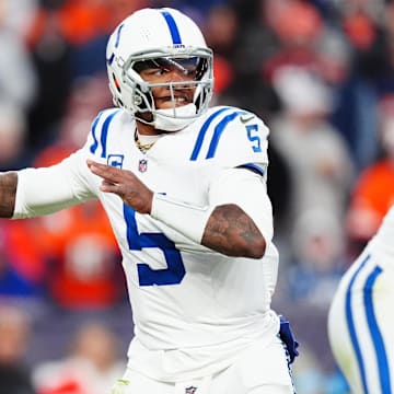 Dec 15, 2024; Denver, Colorado, USA; Indianapolis Colts quarterback Anthony Richardson (5) prepares to pass the ball in the second half against the Denver Broncos at Empower Field at Mile High. Mandatory Credit: Ron Chenoy-Imagn Images