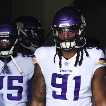 Jan 8, 2023; Chicago, Illinois, USA;  Minnesota Vikings linebacker Patrick Jones II (91) enters the field before the first half against the  Chicago Bears at Soldier Field. Mandatory Credit: Matt Marton-Imagn Images
