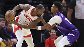 Oct 8, 2025; Houston, Texas, USA; Houston Rockets forward Kevin Durant (7) controls the ball as Utah Jazz forward Ace Bailey (19) defends during the second quarter at Toyota Center. Mandatory Credit: Troy Taormina-Imagn Images