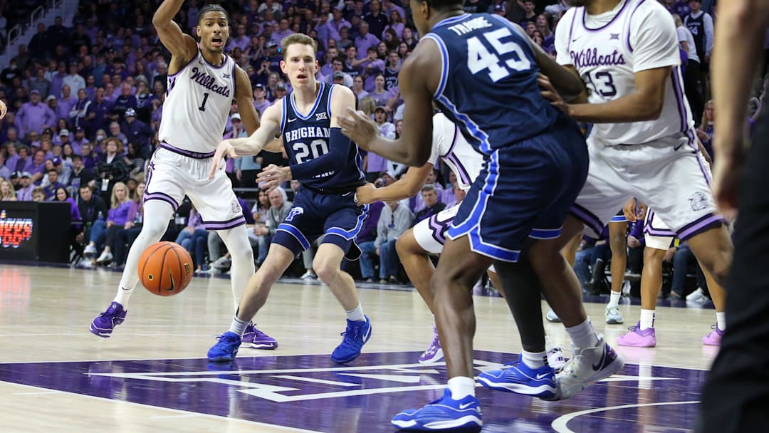 A Brigham Young Cougars guard passes the ball during the second half of the game against the Kansas State Wildcats at Bramlage Coliseum. Mandatory Credit: Scott Sewell-Imagn Images