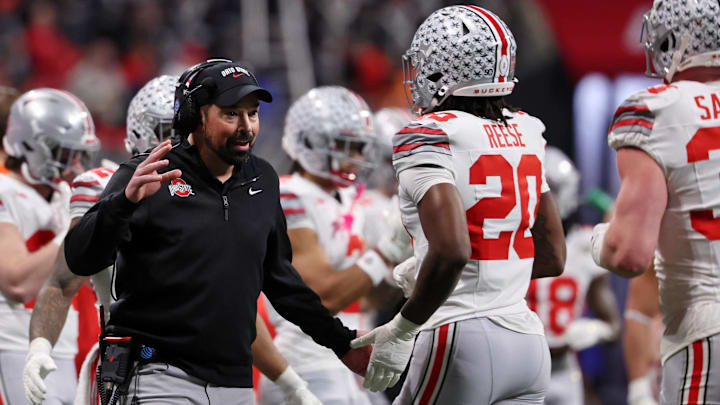 Jan 20, 2025; Atlanta, GA, USA; Ohio State Buckeyes head coach Ryan Day talks with Ohio State Buckeyes linebacker Arvell Reese (20) during the first half the CFP National Championship college football game at Mercedes-Benz Stadium. Mandatory Credit: Brett Davis-Imagn Images