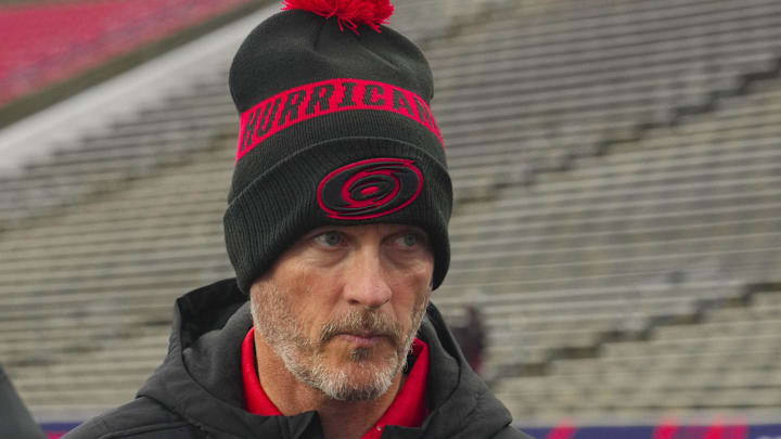 Feb 17, 2023; Raleigh, North Carolina, USA;  Carolina Hurricanes owner Tom Dundon looks on during practice at Carter-Finley Stadium. Mandatory Credit: James Guillory-Imagn Images