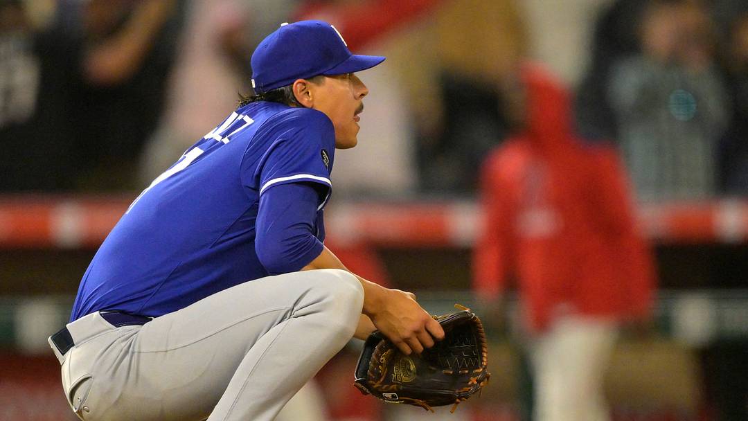 Dodgers relief pitcher José Rodriguez (97) reacts after giving up a walk-off single to Los Angeles Angels left fielder Taylor Ward (3) in the ninth inning at Angel Stadium in a Freeway Series exhibition game on March 24, 2025.