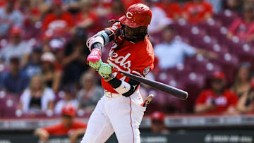Jul 10, 2025; Cincinnati, Ohio, USA; Cincinnati Reds shortstop Elly De La Cruz (44) hits a single in the first inning against the Miami Marlins at Great American Ball Park. Mandatory Credit: Katie Stratman-Imagn Images