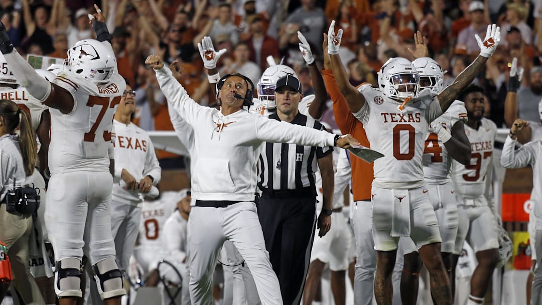 Oct 25, 2025; Starkville, Mississippi, USA; Texas Longhorns head coach Steve Sarkisian reacts after a touchdown during overtime against the Mississippi State Bulldogs at Davis Wade Stadium at Scott Field. Mandatory Credit: Petre Thomas-Imagn Images