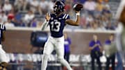 Aug 31, 2024; Oxford, Mississippi, USA; Mississippi Rebels quarterback Austin Simmons (13) passes the ball during the second half  against the Furman Paladins at Vaught-Hemingway Stadium. Mandatory Credit: Petre Thomas-Imagn Images
