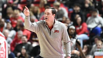Former UNLV Rebels head coach Kevin Kruger gestures to players in the first half against the Utah State Aggies at Thomas & Mack Center. 