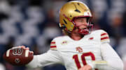 Nov 29, 2025; Syracuse, New York, USA; Boston College Eagles quarterback Shaker Reisig (10) warms up prior to the game against the Syracuse Orange at the JMA Wireless Dome. Mandatory Credit: Rich Barnes-Imagn Images