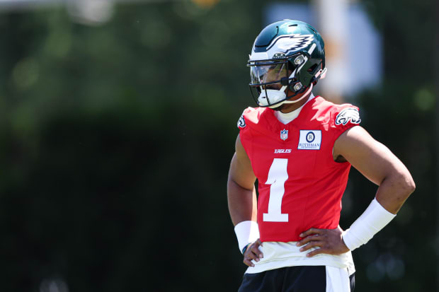 Jalen Hurts standing at an Eagles practice.