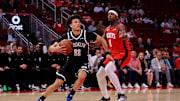 Oct 27, 2025; Houston, Texas, USA; Brooklyn Nets guard Nolan Traore (88) drives to the basket against Houston Rockets forward Jae'Sean Tate (8) during the fourth quarter at Toyota Center. Mandatory Credit: Erik Williams-Imagn Images

