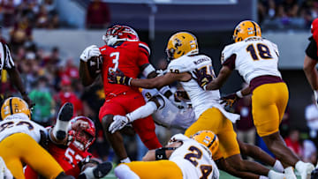 Nov 30, 2024; Tucson, Arizona, USA; Arizona State Sun Devils defensive back Montana Warren (9) tackles Arizona Wildcats running back Kedrick Reescano (3) during the fourth quarter at Arizona Stadium. Mandatory Credit: Aryanna Frank-Imagn Images