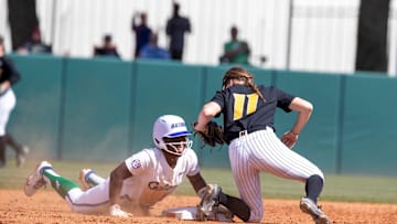 Florida catcher Sam Roe (13) steals second by Missouri utility Julia Crenshaw (11) during game one of a doubleheader with Florida taking on Missouri Friday, March 17, 2023, at Pressly Stadium in Gainesville, Fla. Alan Youngblood/Gainesville Sun

Gai Gatorsoftball 36455451