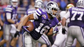 Jan 2, 2015; San Antonio, TX, USA; Kansas State Wildcats wide receiver Tyler Lockett (16) runs after a catch during the second half of the 2015 Alamo Bowl against the UCLA Bruins at Alamodome. The Bruins won 40-35. Mandatory Credit: Soobum Im-USA TODAY Sports