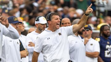 Sep 20, 2025; South Bend, Indiana, USA; Notre Dame Fighting Irish defensive coordinator Chris Ash shouts towards the field against the Purdue Boilermakers during the first half at Notre Dame Stadium. Mandatory Credit: Michael Caterina-Imagn Images