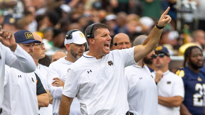 Sep 20, 2025; South Bend, Indiana, USA; Notre Dame Fighting Irish defensive coordinator Chris Ash shouts towards the field against the Purdue Boilermakers during the first half at Notre Dame Stadium. Mandatory Credit: Michael Caterina-Imagn Images