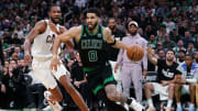 May 15, 2024; Boston, Massachusetts, USA; Boston Celtics forward Jayson Tatum (0) drives the ball against Cleveland Cavaliers forward Evan Mobley (4) in the third quarter during game five of the second round for the 2024 NBA playoffs at TD Garden. Mandatory Credit: David Butler II-USA TODAY Sports