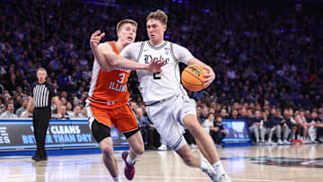 Feb 22, 2025; New York, NY, USA;  Duke basketball guard Cooper Flagg (2) drives past Illinois Fighting Illini forward Ben Humrichous (3) in the first half at Madison Square Garden.