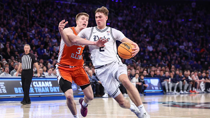 Feb 22, 2025; New York, NY, USA;  Duke basketball guard Cooper Flagg (2) drives past Illinois Fighting Illini forward Ben Humrichous (3) in the first half at Madison Square Garden.