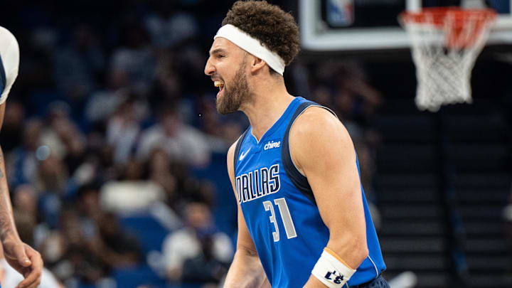 Dallas Mavericks guard-forward Klay Thompson (31) celebrates a three pointer against Orlando Magic in the fourth quarter  at Kia Center. 