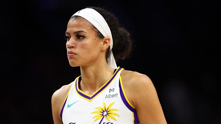 Sep 9, 2025; Phoenix, Arizona, USA; Los Angeles Sparks guard Rae Burrell (12) against the Phoenix Mercury during a WNBA game at PHX Arena. Mandatory Credit: Mark J. Rebilas-Imagn Images