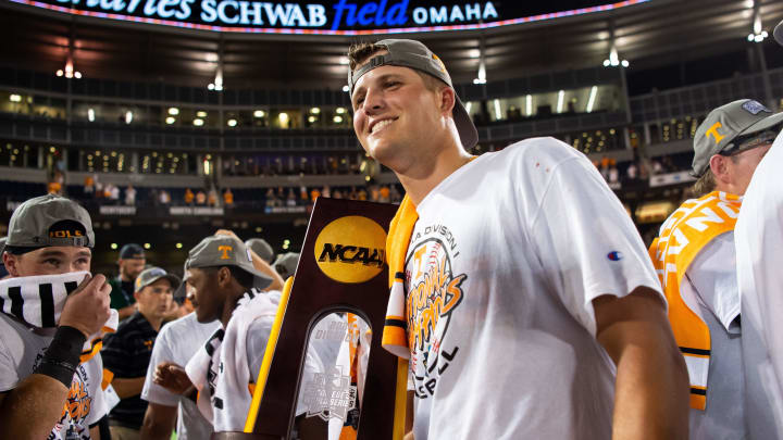 Tennessee's Drew Beam holds the trophy after game three of the NCAA College World Series finals between Tennessee and Texas A&M at Charles Schwab Field in Omaha, Neb., on Monday, June 24, 2024.