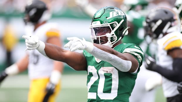 New York Jets running back Breece Hall (20) reacts to a play