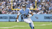 Nov 2, 2025; Nashville, Tennessee, USA; Tennessee Titans wide receiver Elic Ayomanor (5) runs the ball after a catch against the Los Angeles Chargers during the third quarter at Nissan Stadium. Mandatory Credit: Steve Roberts-Imagn Images