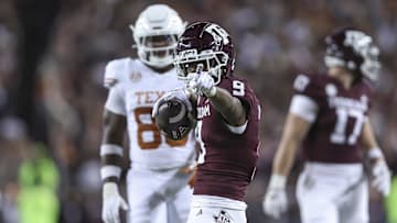 Nov 30, 2024; College Station, Texas, USA; Texas A&M Aggies wide receiver Jahdae Walker (9) signals for a first down after a play during the first quarter against the Texas Longhorns at Kyle Field. Mandatory Credit: Troy Taormina-Imagn Images