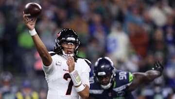 Oct 20, 2025; Seattle, Washington, USA; Houston Texans quarterback C.J. Stroud (7) throws a pass during the first quarter against the Seattle Seahawks at Lumen Field. Mandatory Credit: Kevin Ng-Imagn Images